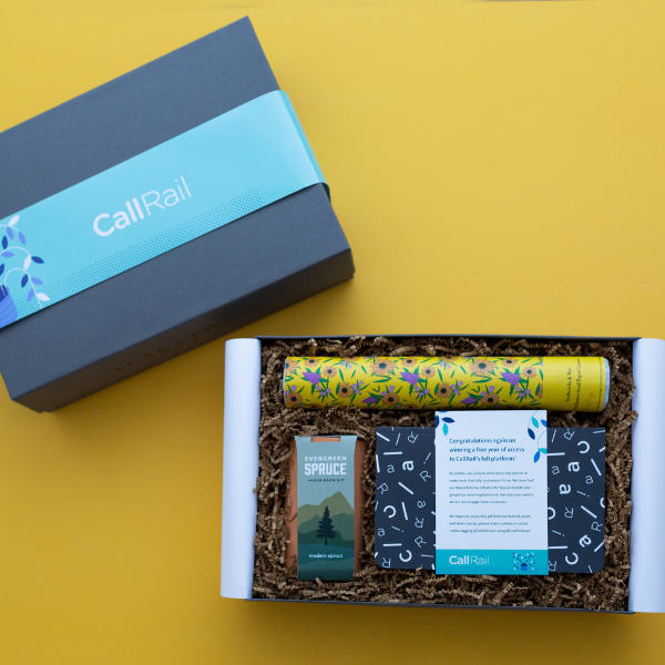 blue callrail logo and plant themed gift box on yellow background