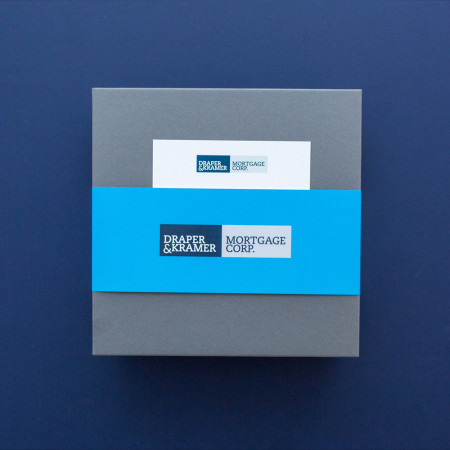 blue and grey branded packaging for client gift