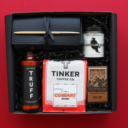 tinker coffee in gift box on red background