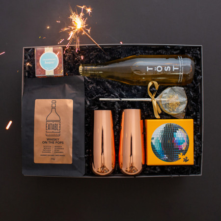 celebration themed gift box with sparkler