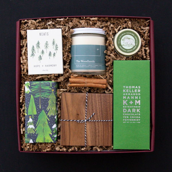 christmas tree themed gift box with chocolate and cookies