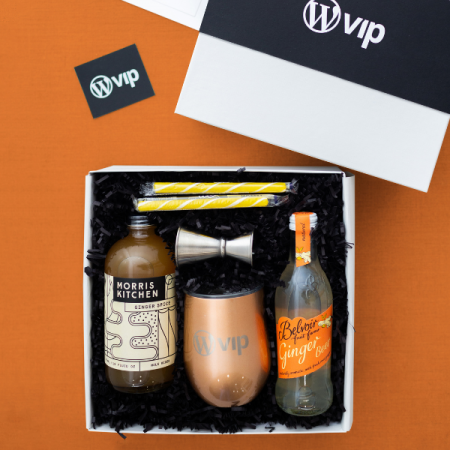 orange cocktail gift box with branded tumbler for cocktail event