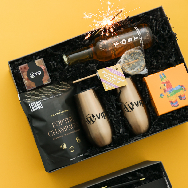 festive black and gold gift with branded tumblers