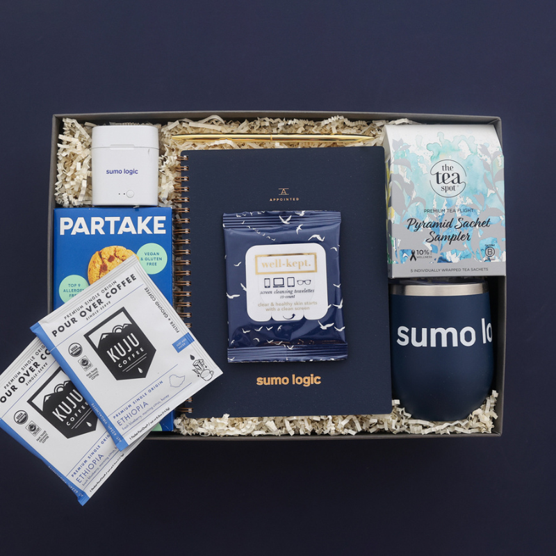 blue and navy office gift with snacks and branded mug